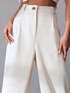 Elise Pleated Trousers detail view styled for Avrienne