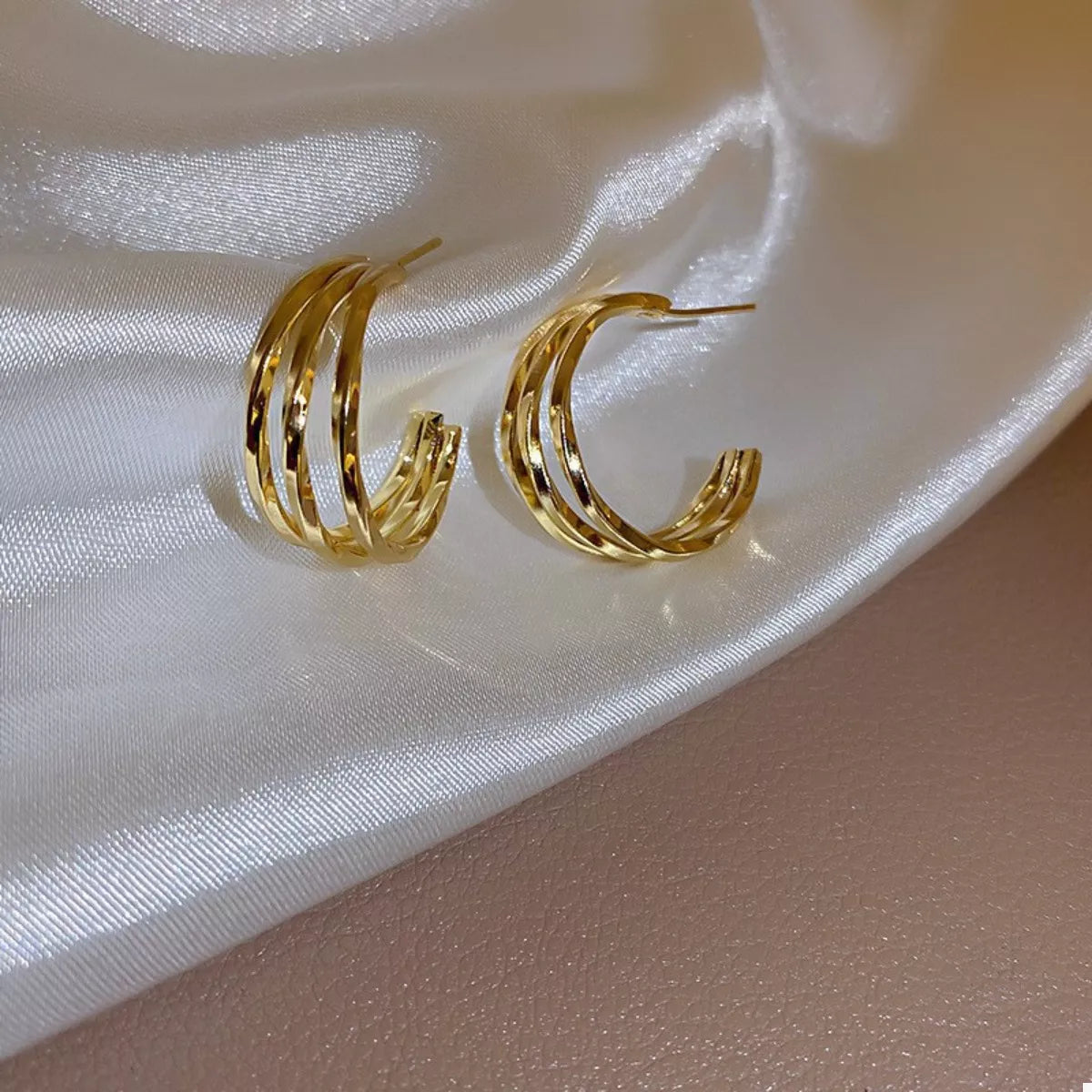 Delphine Hoop Earrings detail view styled for Avrienne
