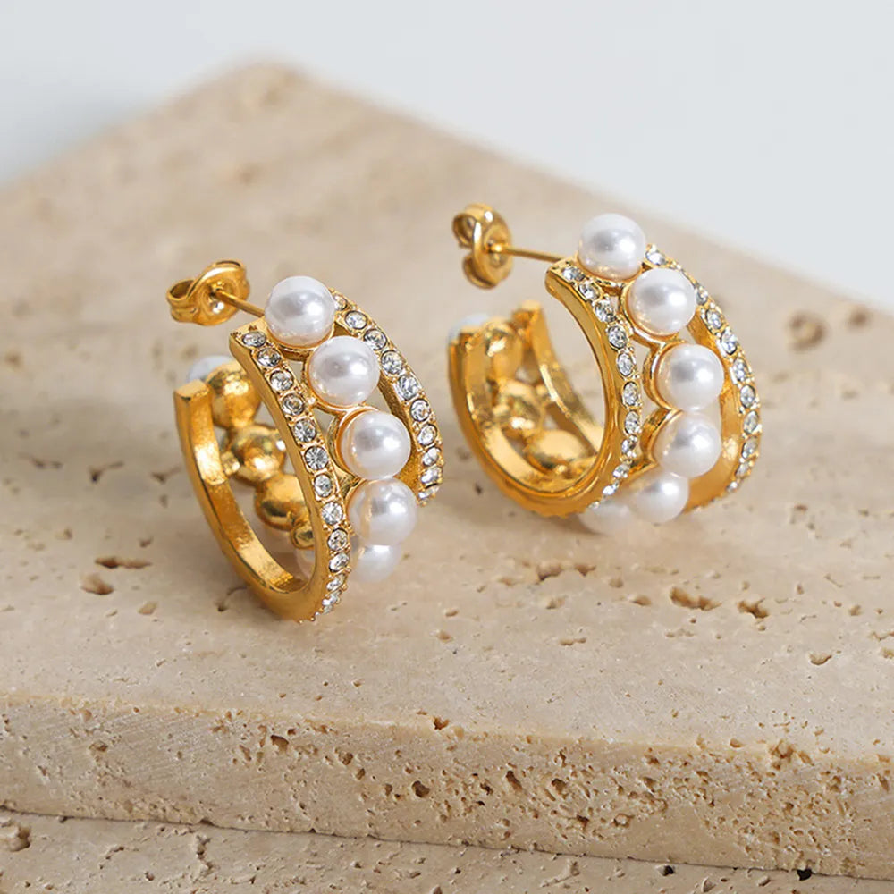 Corinne C-Hoop Earrings detail view styled for Avrienne