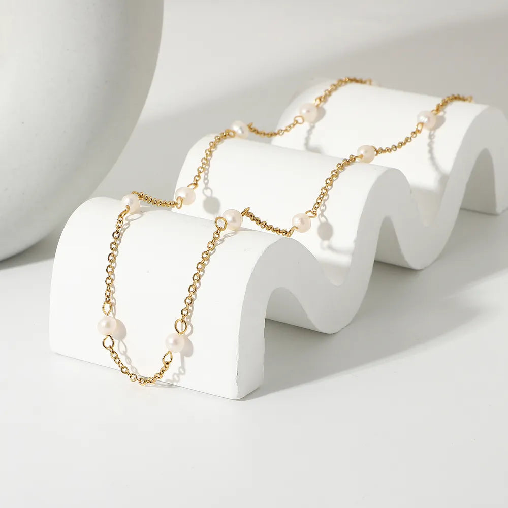 Margaux Pearl Necklace detail view styled for Avrienne