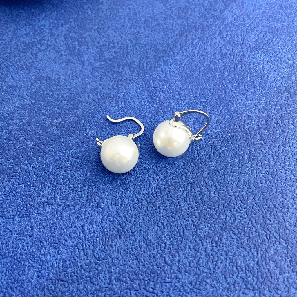 Maren Pearl Earrings detail view styled for Avrienne