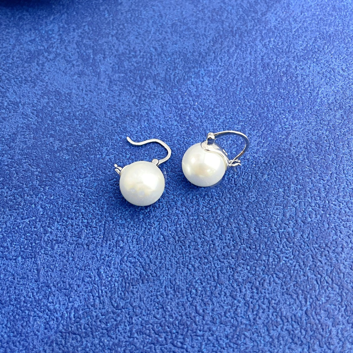 Maren Pearl Earrings detail view styled for Avrienne