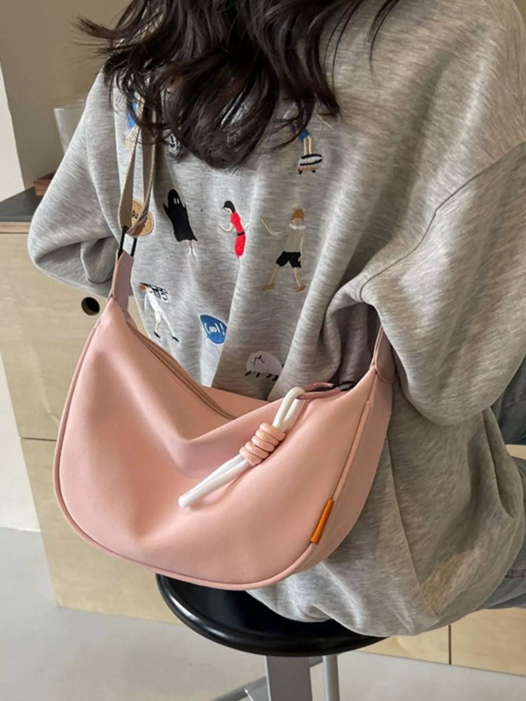 Amalia Straw Crossbody detail view styled for Avrienne