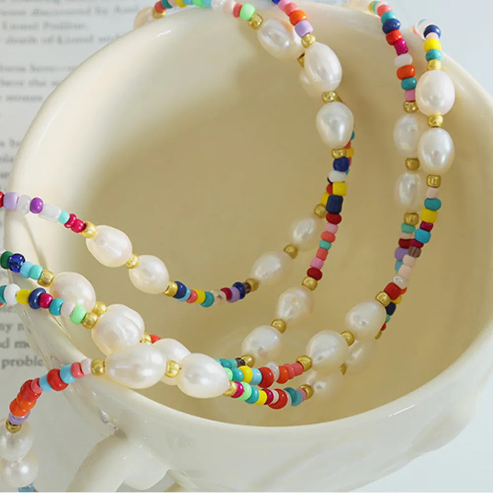 Ottilie Bead Necklace detail view styled for Avrienne
