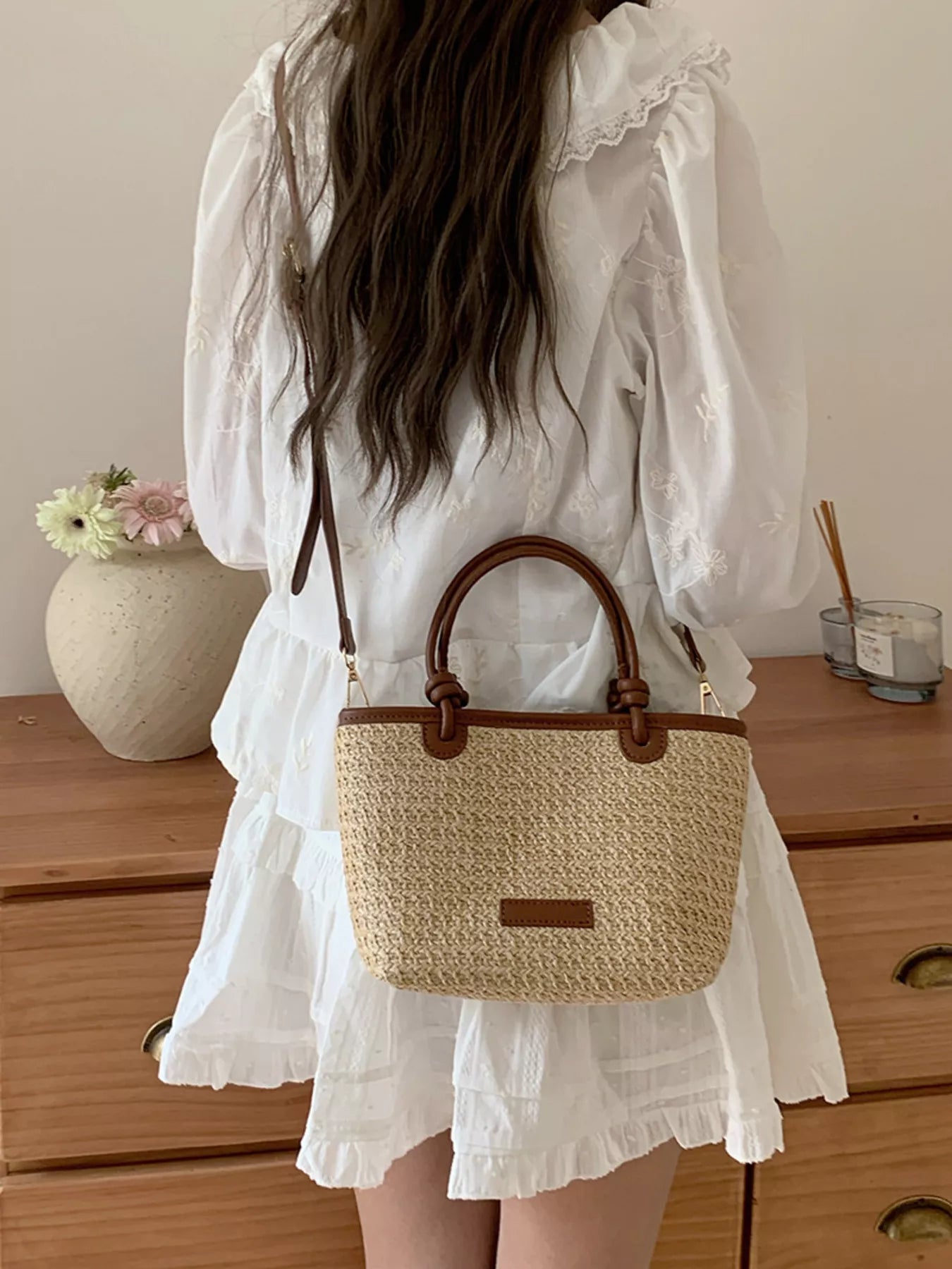 Lumi Straw Crossbody detail view styled for Avrienne