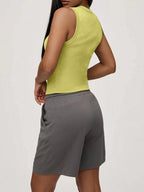 Elara Button Tank detail view styled for Avrienne