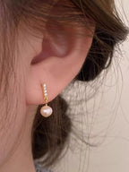 Liora Pearl Earrings detail view styled for Avrienne