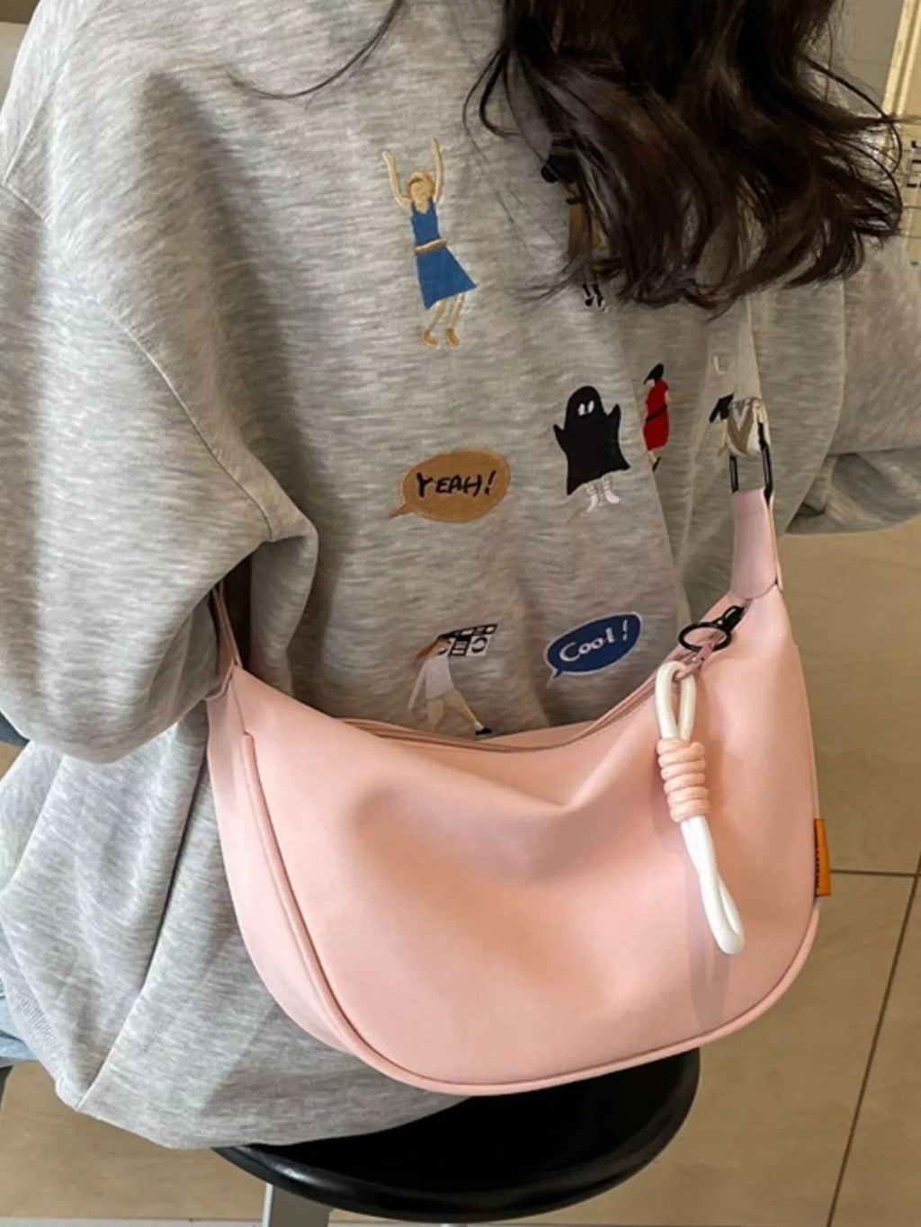 Amalia Straw Crossbody detail view styled for Avrienne