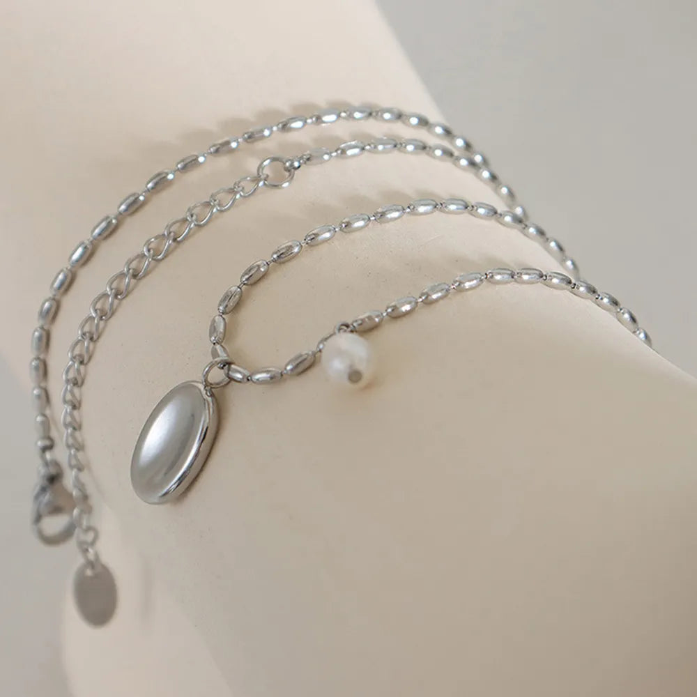 Arielle Pearl Necklace detail view styled for Avrienne