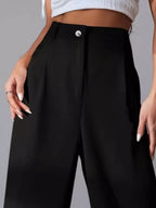 Elise Pleated Trousers detail view styled for Avrienne