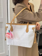 Cosette Woven Tote detail view styled for Avrienne