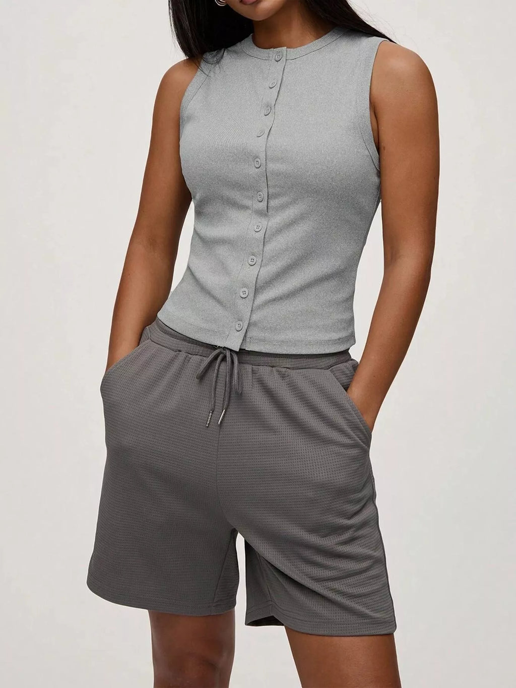 Elara Button Tank detail view styled for Avrienne