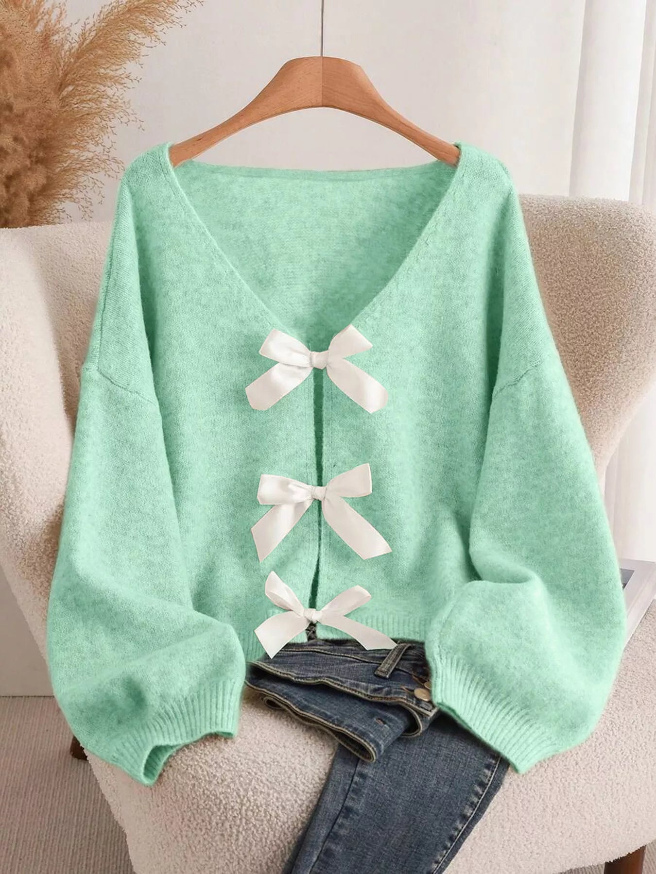 Dahlia Bow Knit Cardigan detail view styled for Avrienne