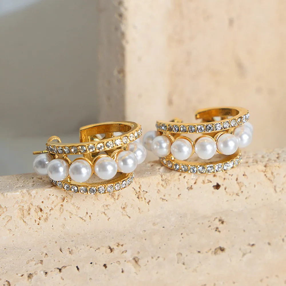 Corinne C-Hoop Earrings detail view styled for Avrienne