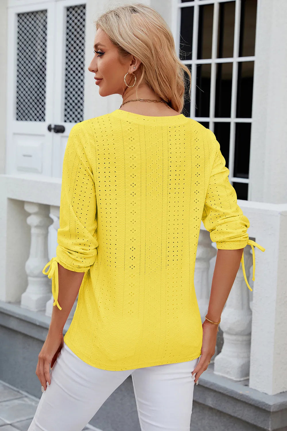 Petra Eyelet Top detail view styled for Avrienne