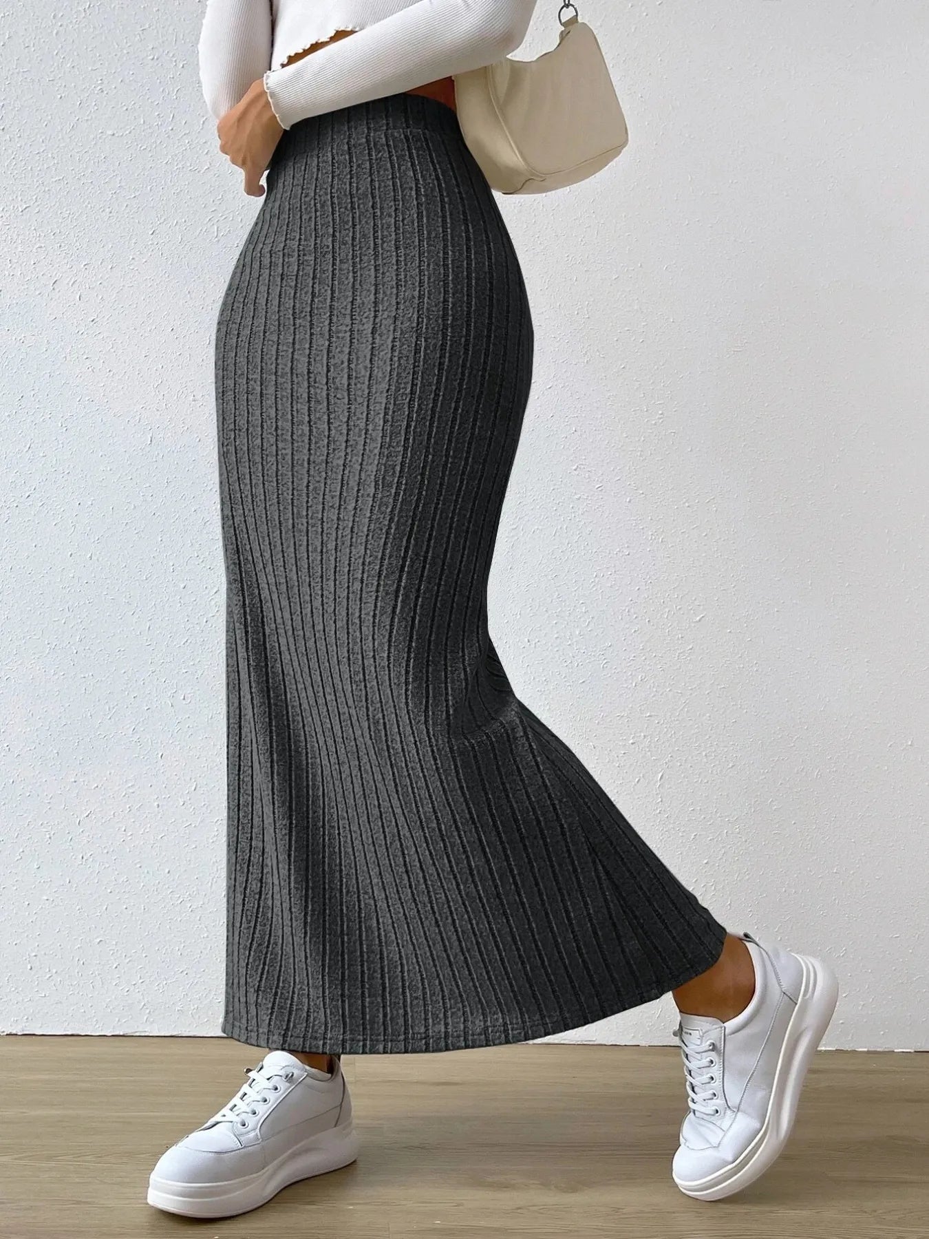 Noemi Ribbed Knit Skirt detail view styled for Avrienne