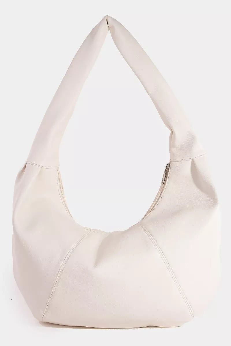 Ines Crescent Bag detail view styled for Avrienne