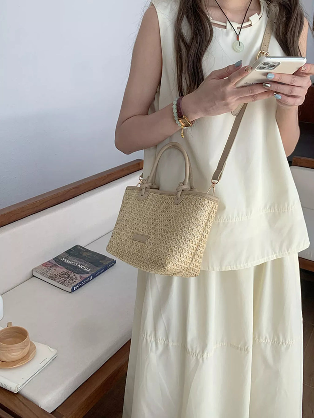 Lumi Straw Crossbody detail view styled for Avrienne