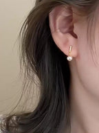 Liora Pearl Earrings detail view styled for Avrienne