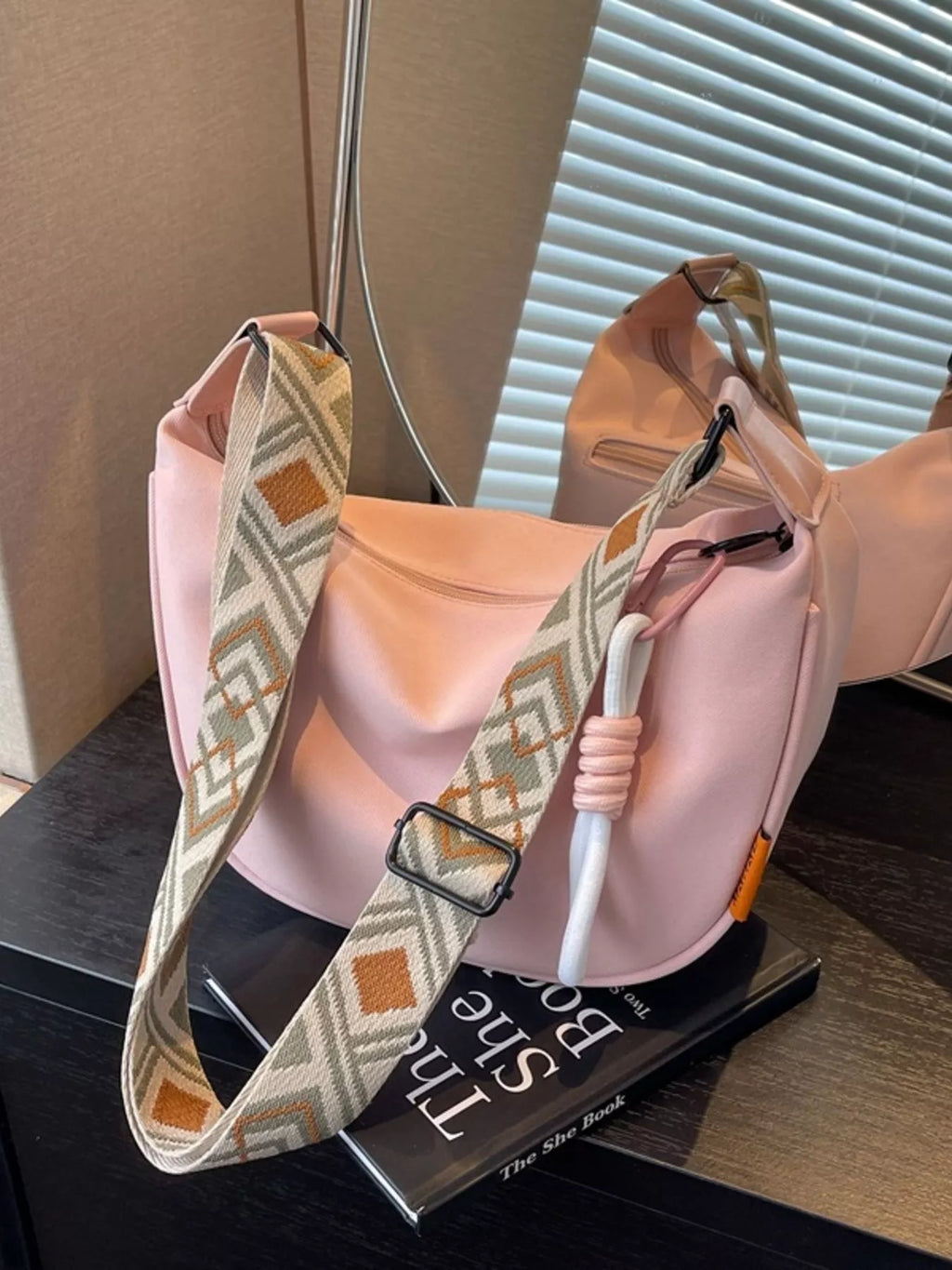 Amalia Straw Crossbody detail view styled for Avrienne