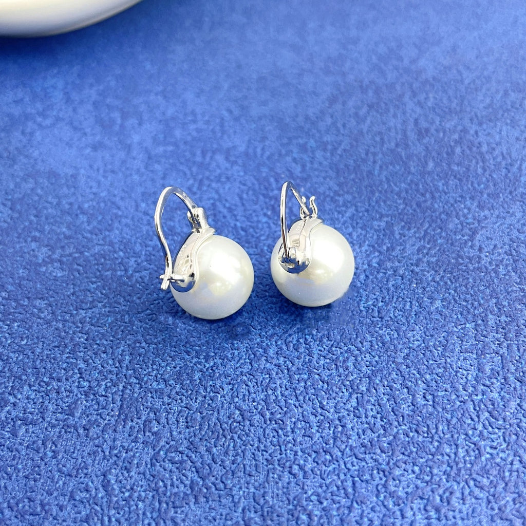 Maren Pearl Earrings detail view styled for Avrienne