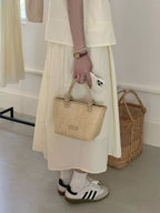 Lumi Straw Crossbody detail view styled for Avrienne
