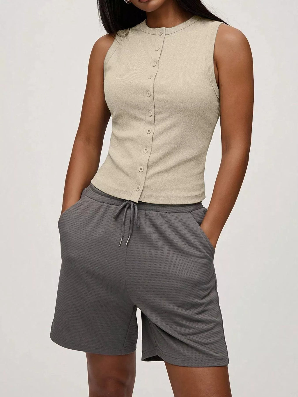 Elara Button Tank detail view styled for Avrienne