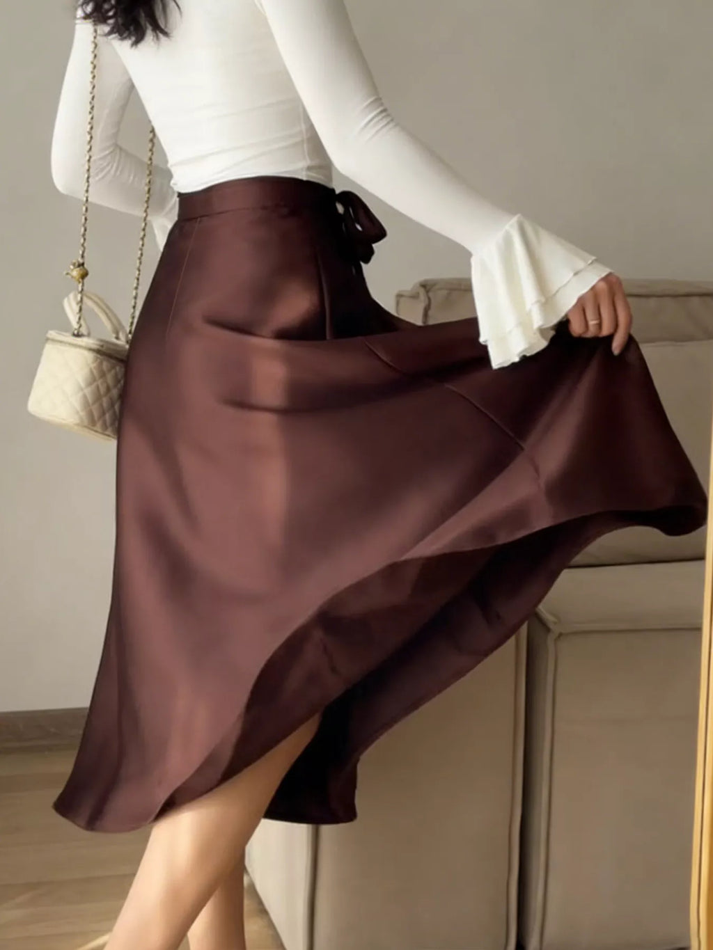 Iris Satin Skirt detail view styled for Avrienne