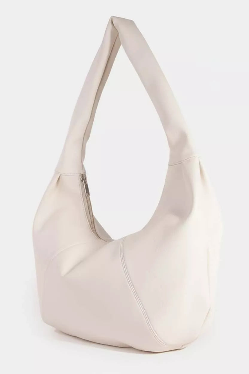 Ines Crescent Bag detail view styled for Avrienne