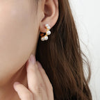 Vera Pearl Earrings detail view styled for Avrienne
