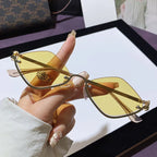 Nadia Cat-Eye Sunglasses detail view styled for Avrienne