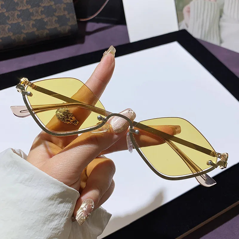 Nadia Cat-Eye Sunglasses detail view styled for Avrienne