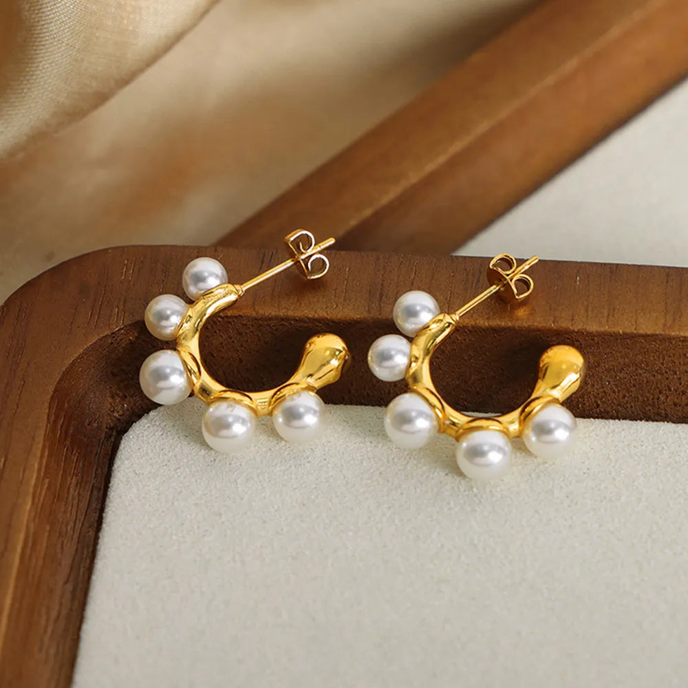 Vera Pearl Earrings detail view styled for Avrienne