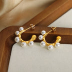 Vera Pearl Earrings detail view styled for Avrienne