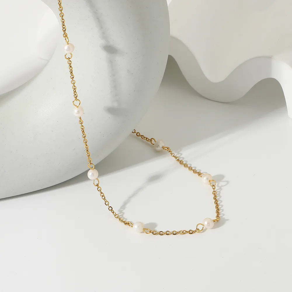Margaux Pearl Necklace detail view styled for Avrienne