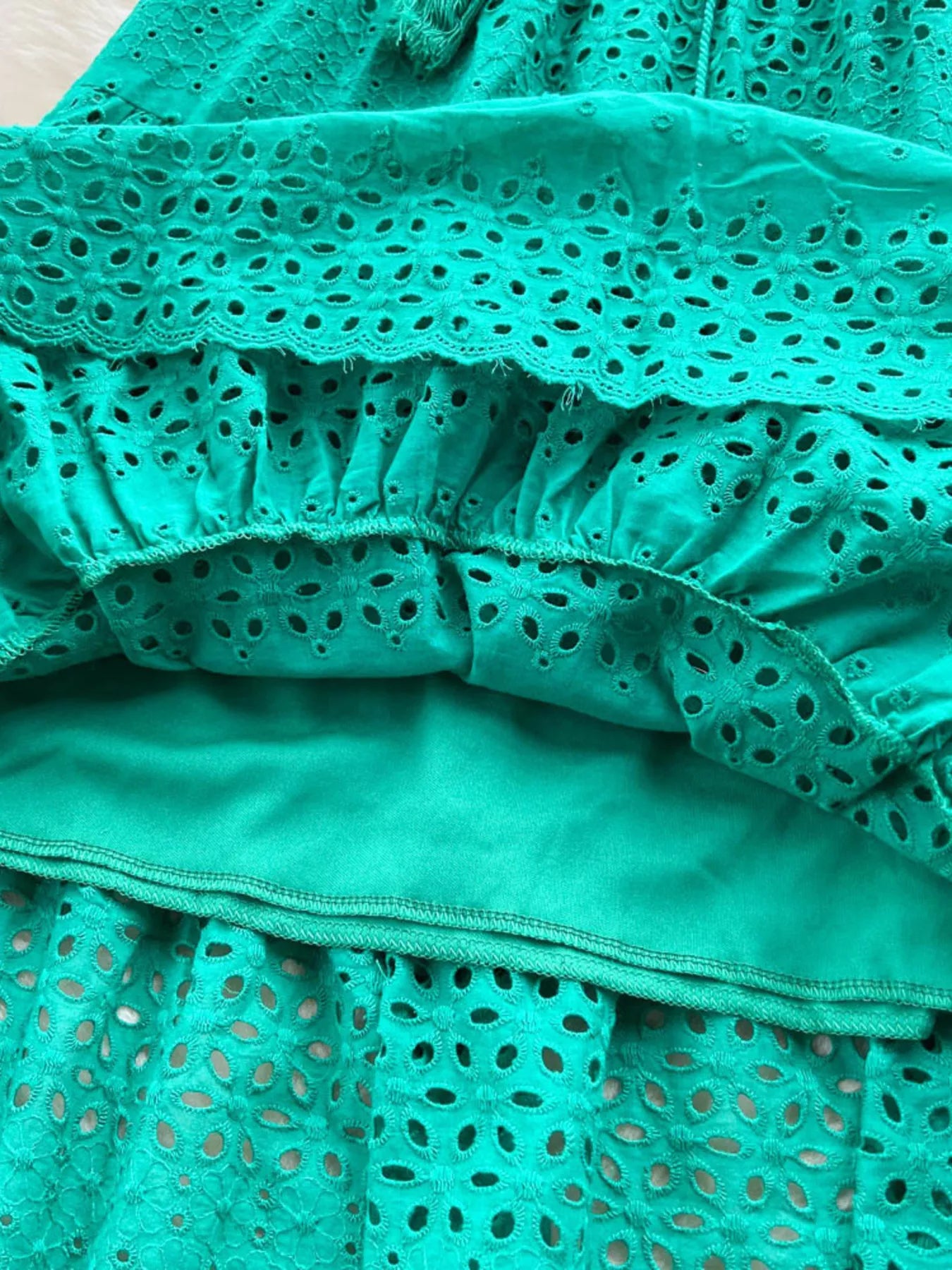 Soleil Eyelet Skirt detail view styled for Avrienne