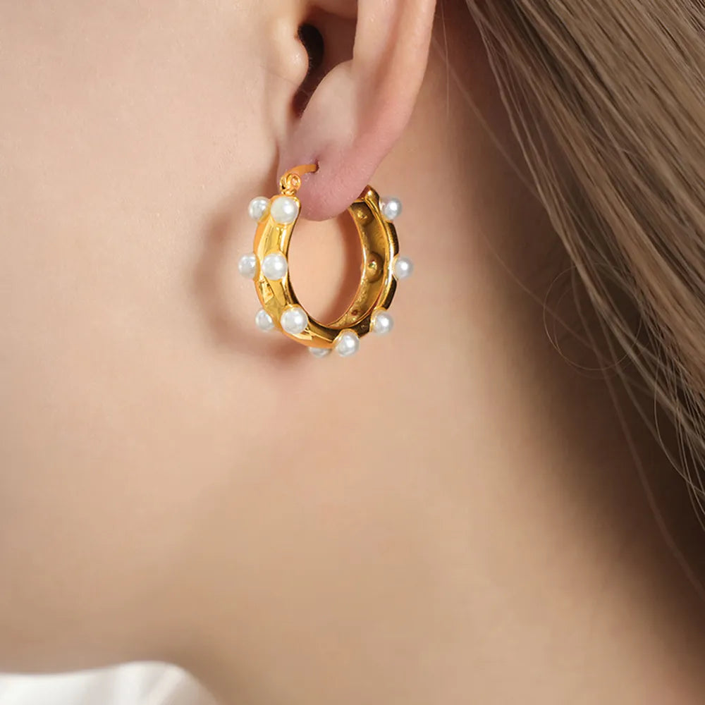 Vera Pearl Earrings detail view styled for Avrienne
