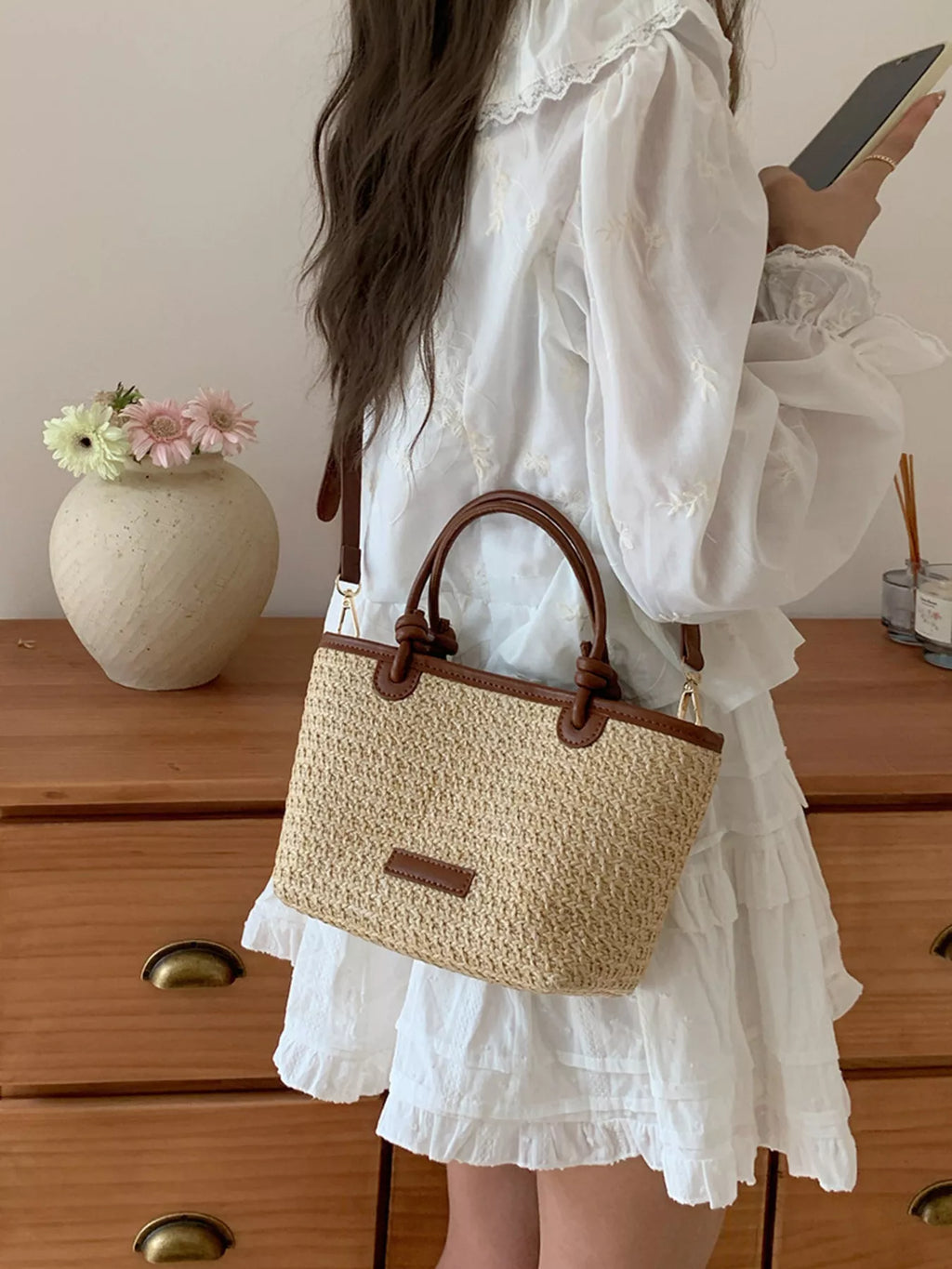 Lumi Straw Crossbody detail view styled for Avrienne