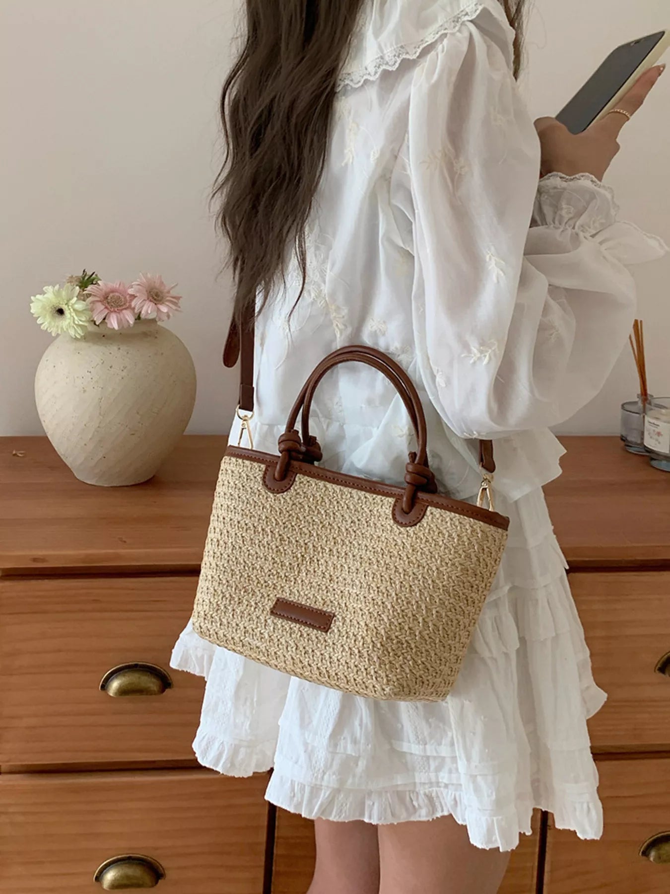 Lumi Straw Crossbody detail view styled for Avrienne
