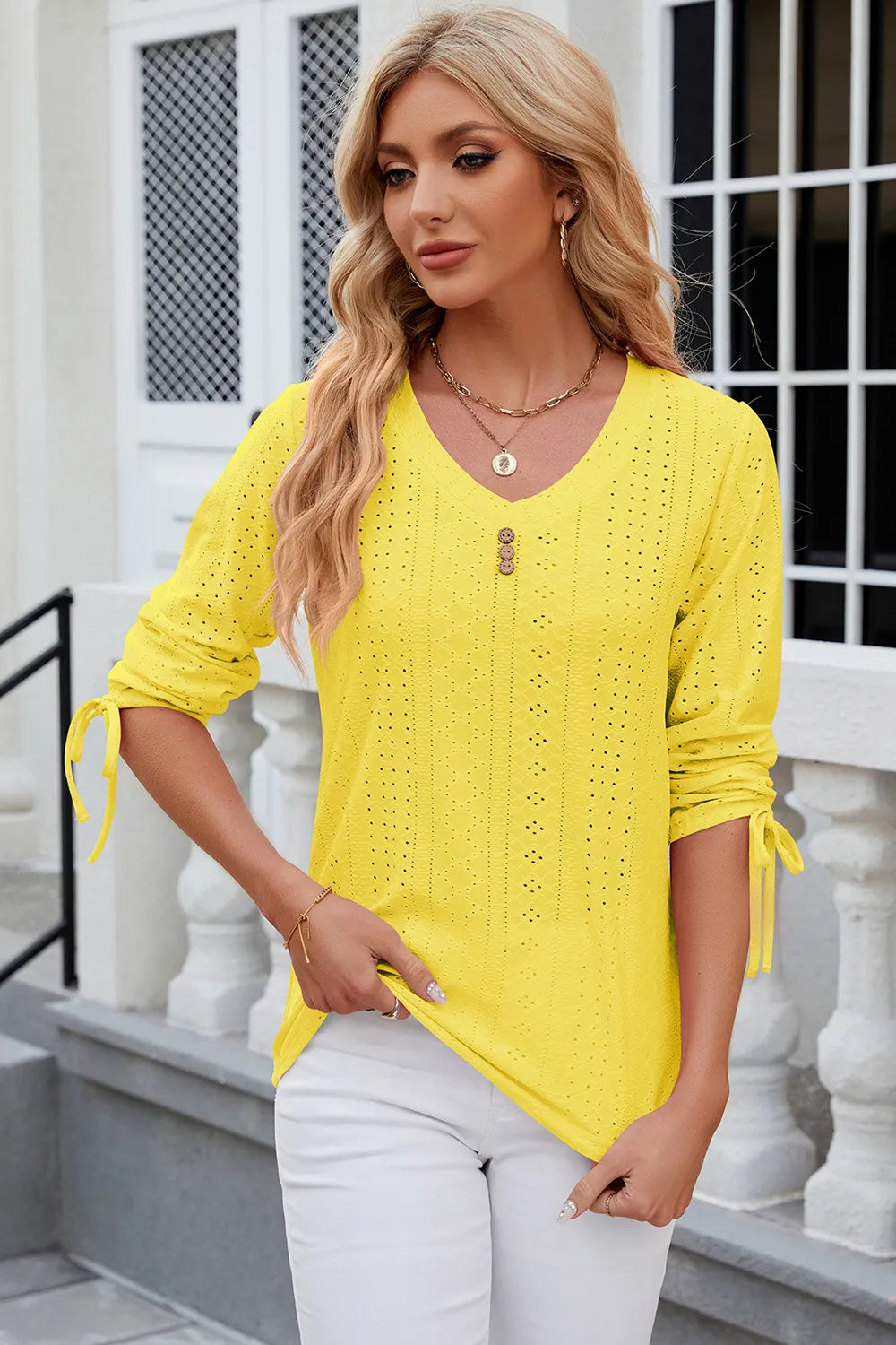 Petra Eyelet Top detail view styled for Avrienne