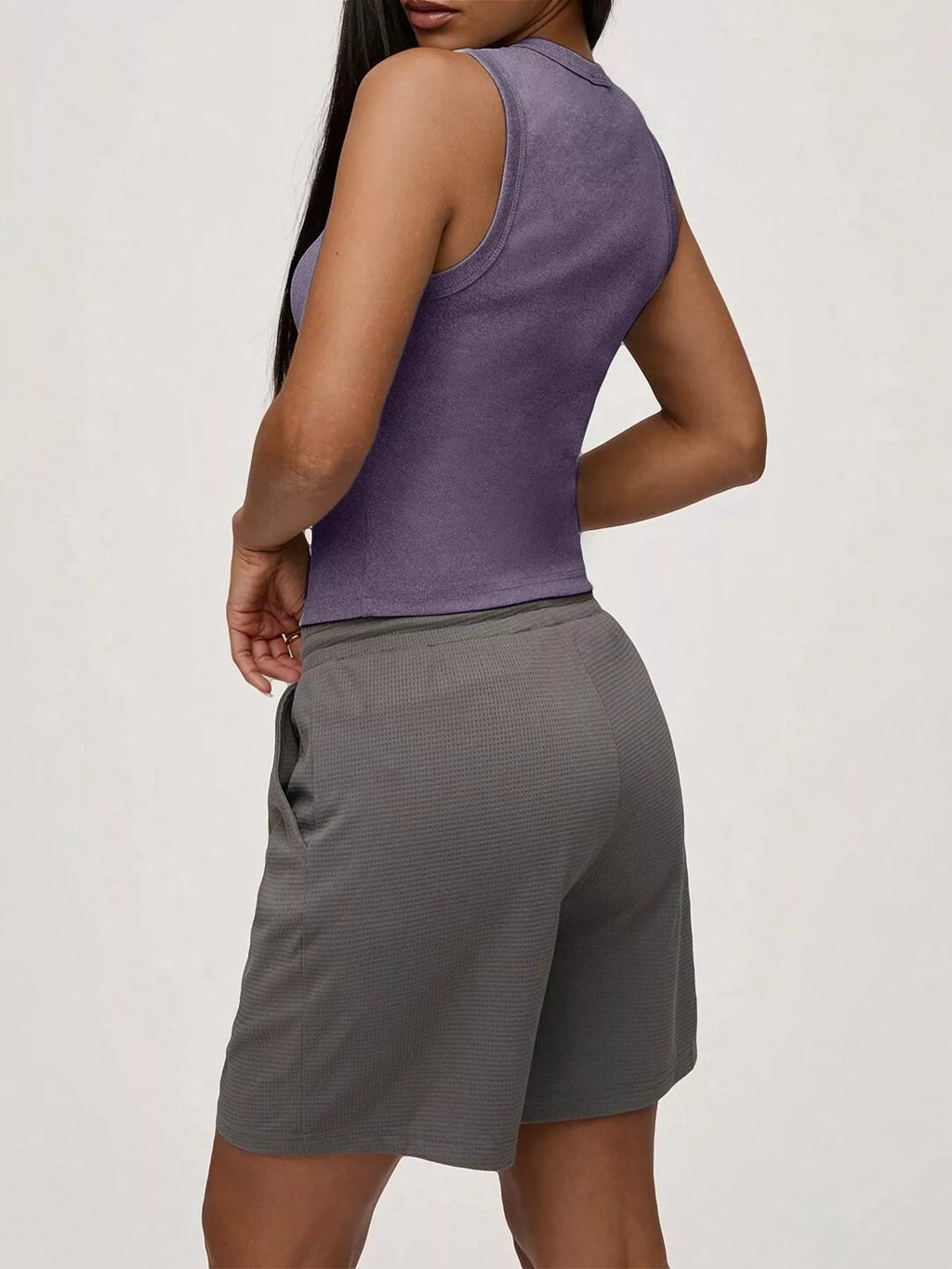 Elara Button Tank detail view styled for Avrienne
