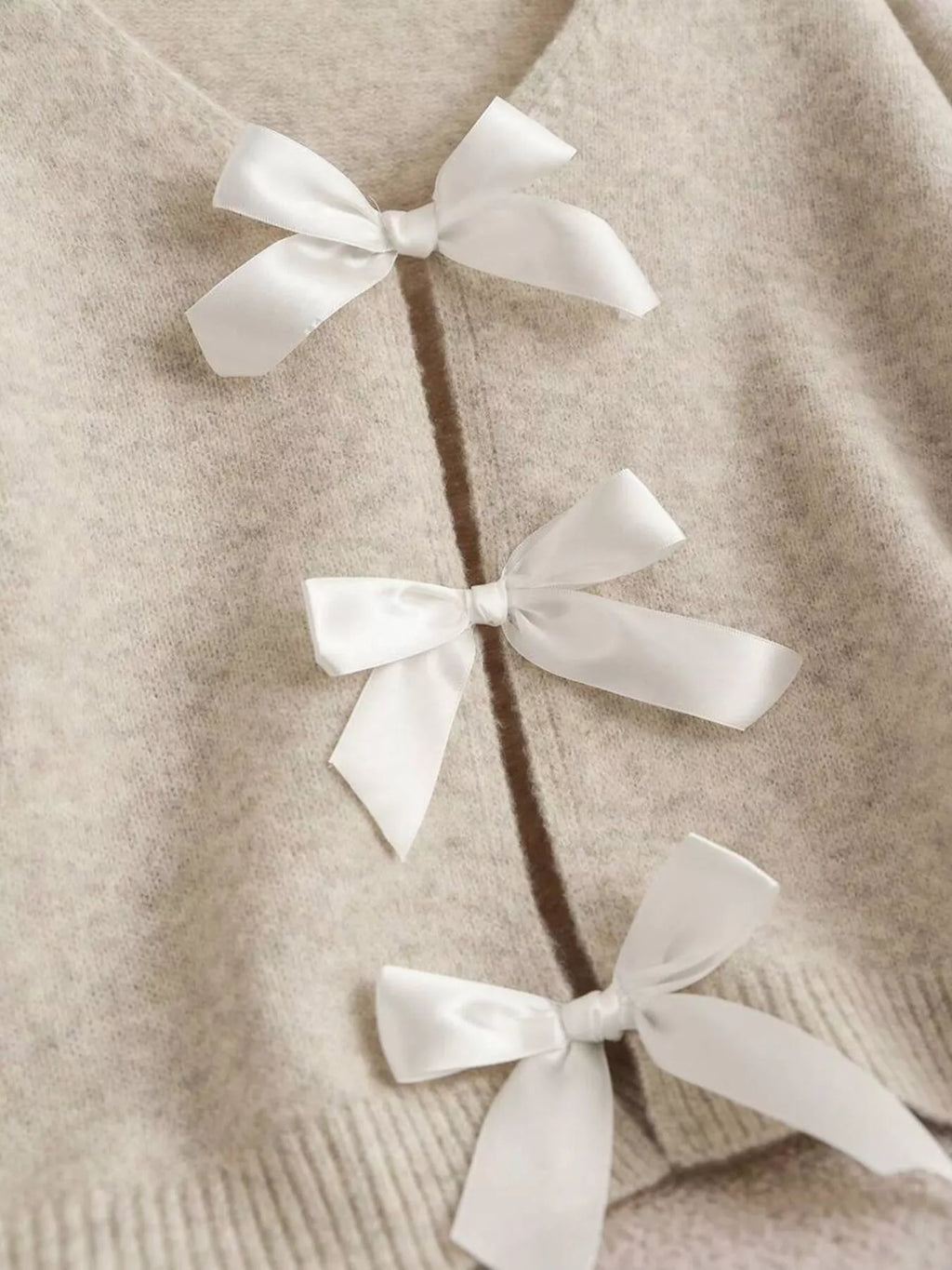 Dahlia Bow Knit Cardigan detail view styled for Avrienne
