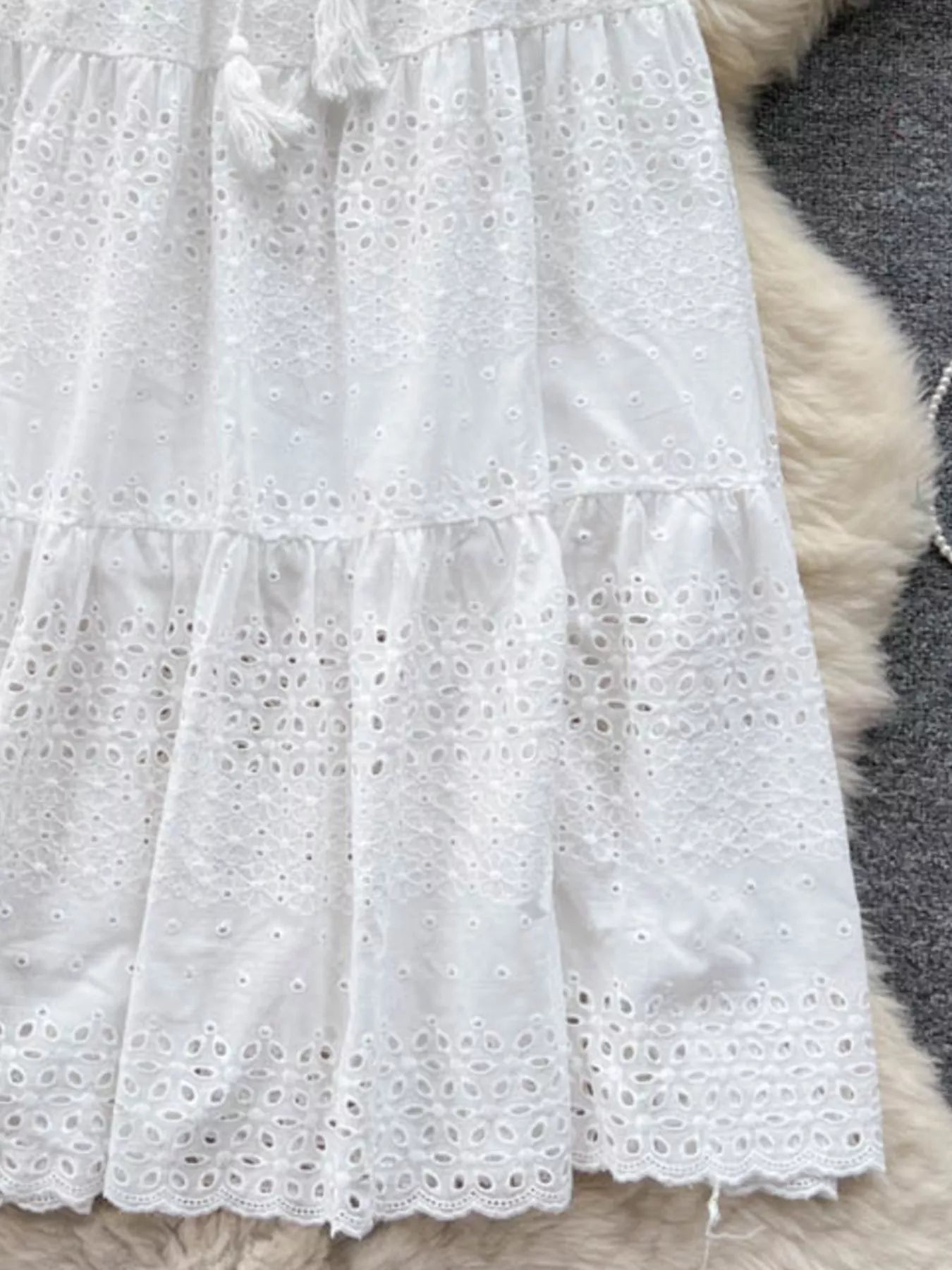 Soleil Eyelet Skirt detail view styled for Avrienne