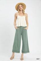 Mila Linen Trousers detail view styled for Avrienne