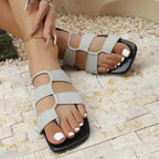 Madeleine Toe-Loop Sandals detail view styled for Avrienne