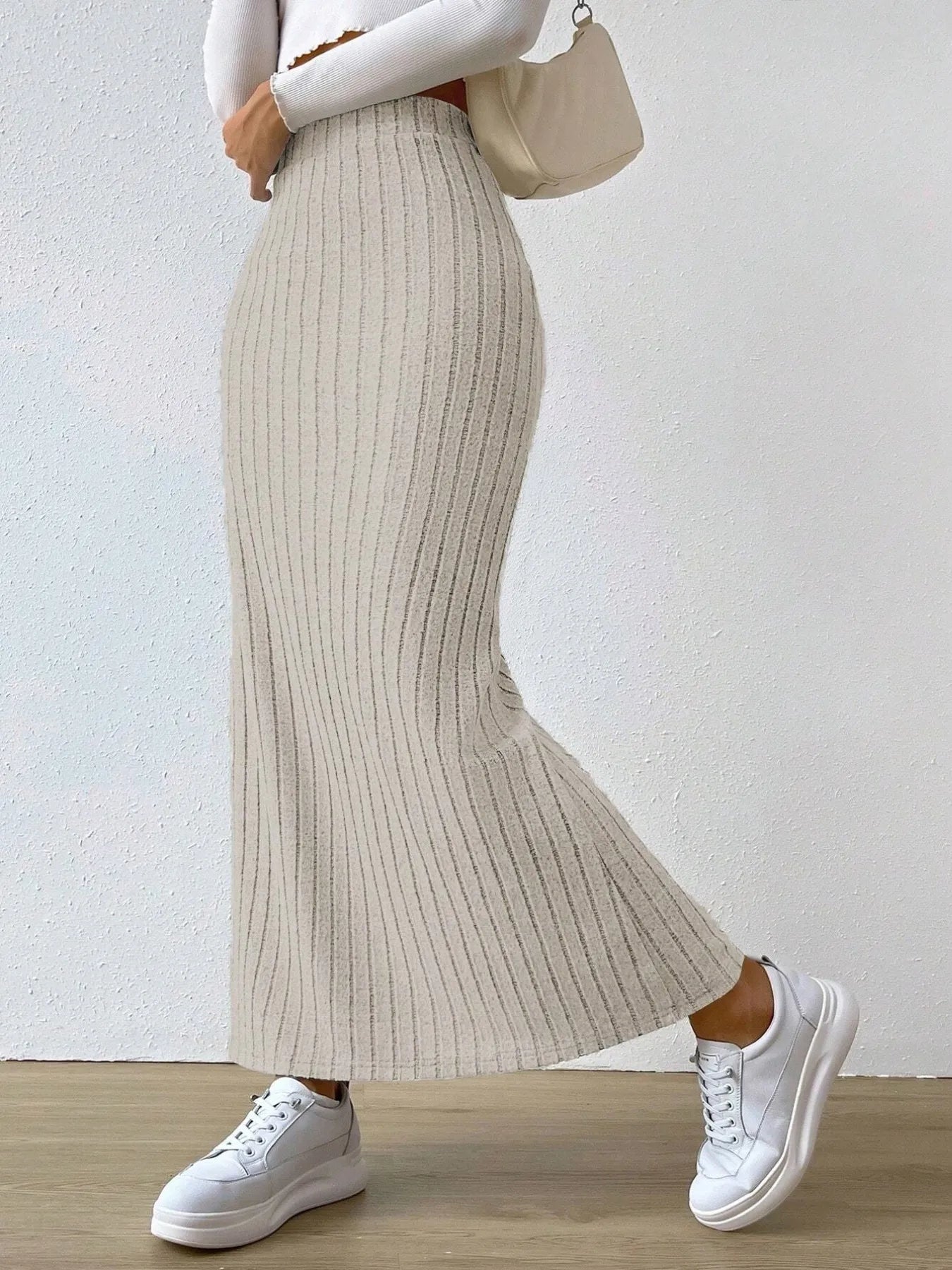 Noemi Ribbed Knit Skirt detail view styled for Avrienne