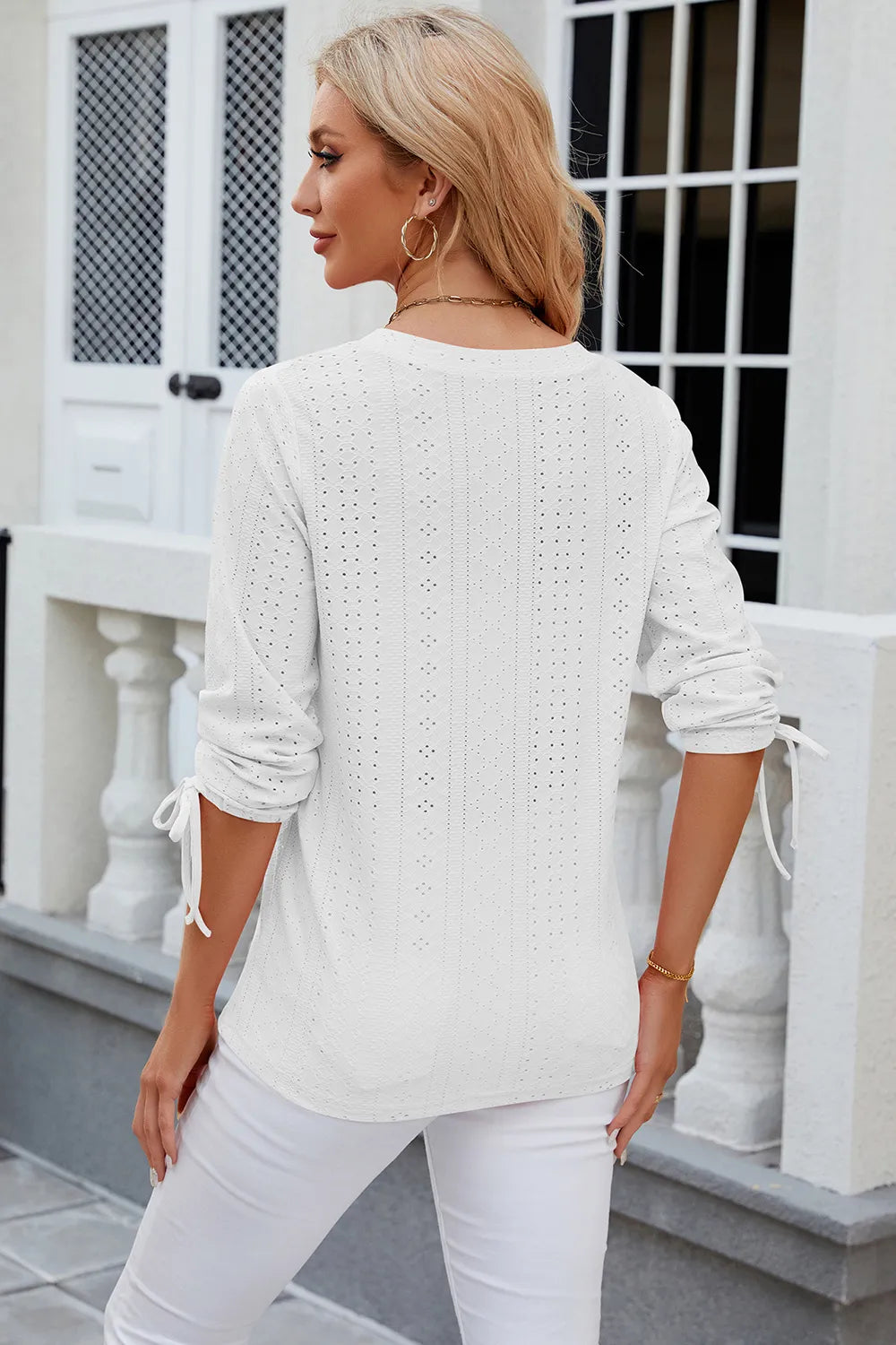 Petra Eyelet Top detail view styled for Avrienne