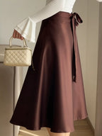 Iris Satin Skirt detail view styled for Avrienne