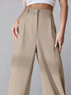 Elise Pleated Trousers detail view styled for Avrienne