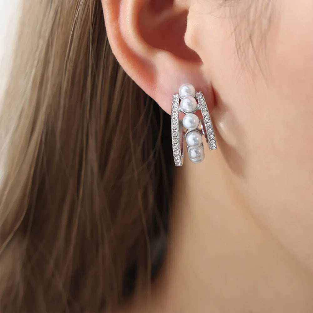 Corinne C-Hoop Earrings detail view styled for Avrienne
